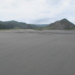 Whatipu Beach enclosed by hills