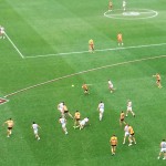 A scramble for control as a player tries to mark, Australian Rules Football