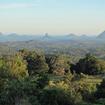 Glass House mountains viewed from a ridge in the evening light