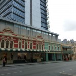 Skyscraper arises from an older facade