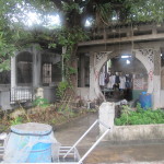 Caretakers occupying a Chinese cemetery mansion