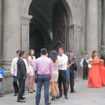 Wedding parties await their turn at San Agustin church