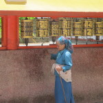 Spinning the prayer wheels, Darjeeling