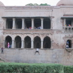 Local Indians lounge at the ancient madrasa, or try to enter