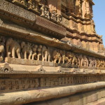 Rhythmic bas-relief of lower band at Lakshmana Temple