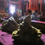 Robes and praying stations await monks, Likkir Monastery
