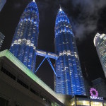 Petronas Towers high above busy Surya mall, KL