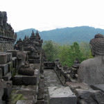 Buddha looks out on the Borobudur walkways, empty of acolytes