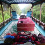 Sleeping, eating, boating outside aboard a houseboat, Sekonyer River
