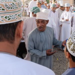 Goat seller stops to negotiate