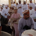 Sellers circle the rotunda at Nizwa goat market