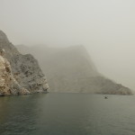 Cliffs in the mist, the fjords of Musaman Peninsula, Oman